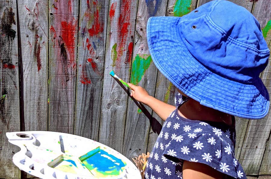 Painting the fence.