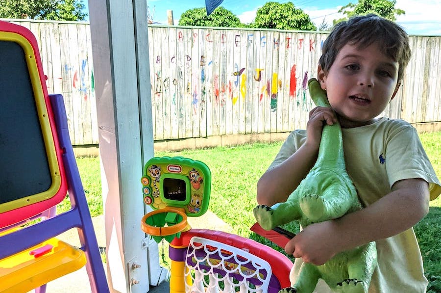 Playing with the outdoor toy set.